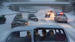 Heavy snow arrives sooner than feared as officials warn of deadly risks while families refuse to cancel long-awaited holiday trips