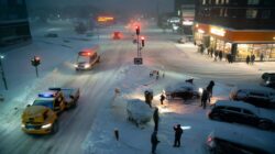 Heavy snow expected tonight as authorities urge drivers to stay home while businesses push to keep normal operations running